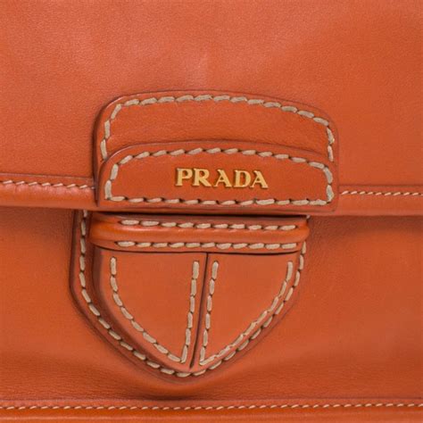 prada clutch orange|Prada clutch.